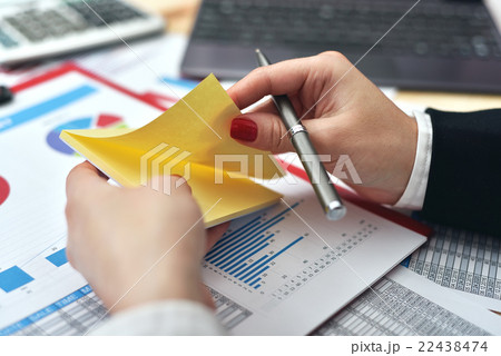 woman tears off sticker woman tears off sticker 22438474
