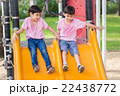 Two little asian boy play slider at playground 22438772