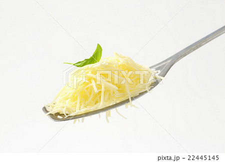 Heap of grated cheese Heap of grated cheese 22445145