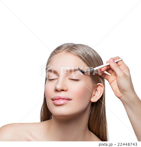 Woman correcting eyebrows form Woman correcting eyebrows form 22448743