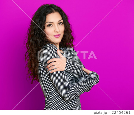 beautiful girl glamour portrait on purple, long curly hair beautiful girl glamour portrait on purple, long curly hair 22454261