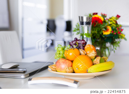 fresh fruits on office table fresh fruits on office table 22454875