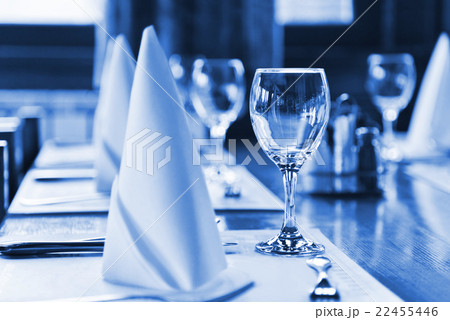 Glasses and plates on table in restaurant Glasses and plates on table in restaurant 22455446