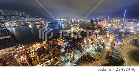 Cargo ship and crane at port reflect on sea bay, Cargo ship and crane at port reflect on sea bay, 22457440
