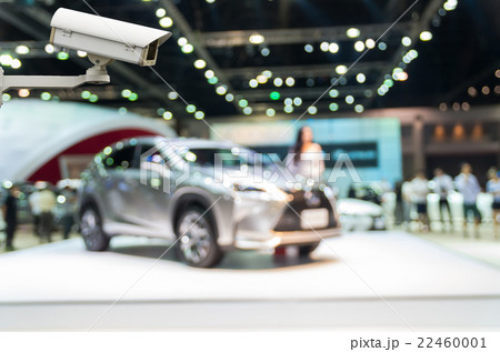 CCTV security camera on monitor the Abstract blurred photo of motor show, car show room 22460001