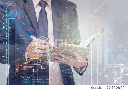 Double exposure of businessman with Trading graph on the cityscape background,Business financial concept Double exposure of businessman with Trading graph on the cityscape background,Business financial concept 22460003