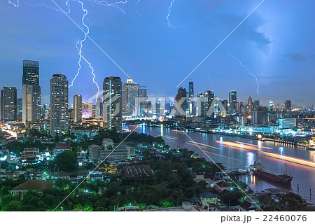 Lightning Storm over Bangkok cityscape river side at twilight in Bangkok, Thailand Lightning Storm over Bangkok cityscape river side at twilight in Bangkok, Thailand 22460076