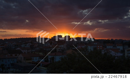 Sunset over village Sunset over village 22467918