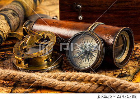Old vintage compass and navigation instruments on Old vintage compass and navigation instruments on 22471788