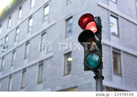 Red Traffic light in downtown with clipping path 22476539