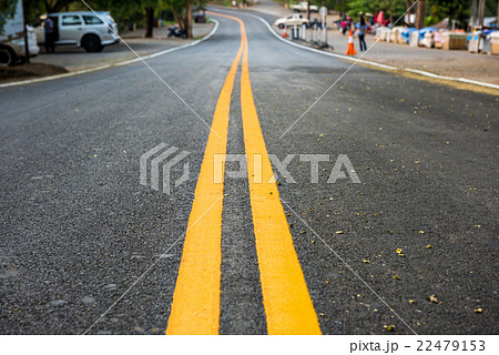 Asphalt road, yellow line on the new road 22479153
