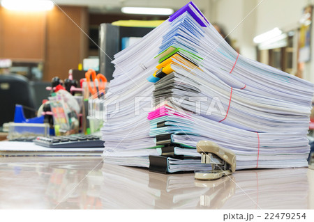 Stack of business papers on office desk Stack of business papers on office desk 22479254