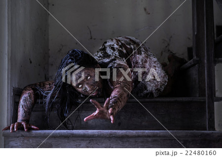 Zombie girl in haunted house 22480160