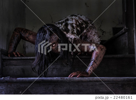 Zombie girl in haunted house Zombie girl in haunted house 22480161