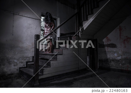 Zombie girl in haunted house 22480163
