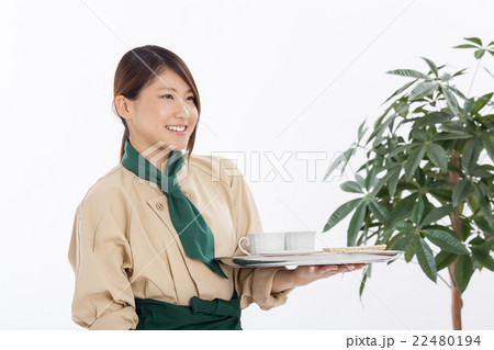 ウェイトレスのバイトをする可愛い女の子の写真素材
