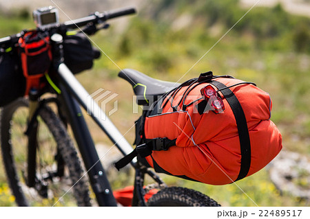 Bicycle with orange bags for travel 22489517