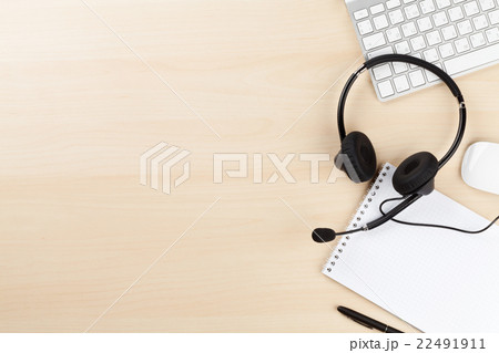 Office desk with headset and pc Office desk with headset and pc 22491911