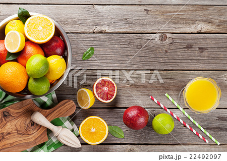 Fresh ripe citruses and juice 22492097