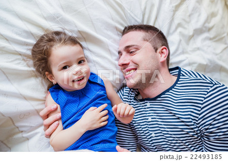 Father having fun with his cute little daughter Father having fun with his cute little daughter 22493185