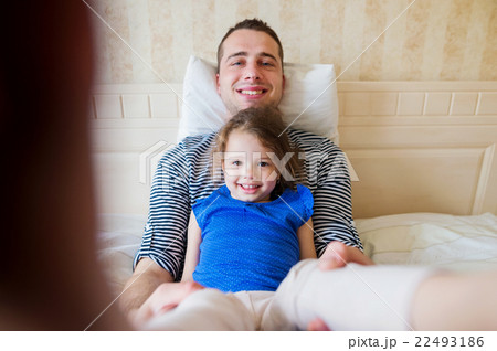 Father having fun with his cute little daughter Father having fun with his cute little daughter 22493186