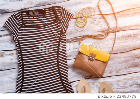 Striped black dress and sunglasses. Striped black dress and sunglasses. 22493778