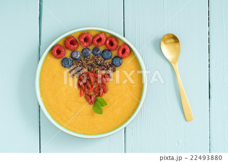 Peach smoothie bowl 22493880