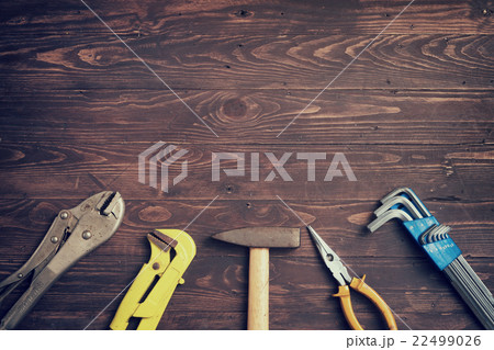 tools on wooden background. 22499026