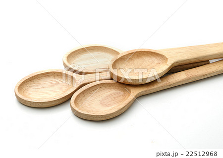Four wooden spoons isolated on white. Four wooden spoons isolated on white. 22512968
