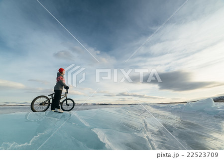 Girl on a bmx on ice. Girl on a bmx on ice. 22523709