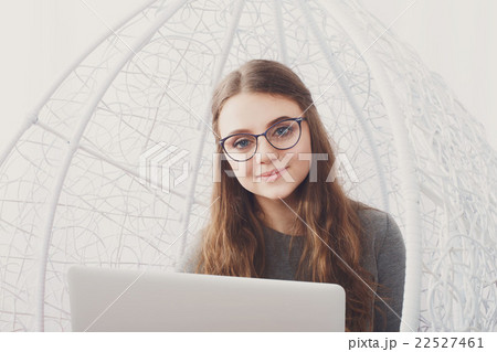 Stylish woman high key portrait with laptop. Stylish woman high key portrait with laptop. 22527461