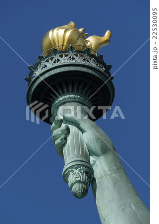 Torch of Statue of Liberty against clear sky 22530095