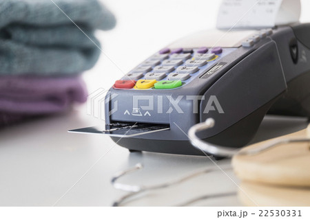 Credit card reader on counter Credit card reader on counter 22530331