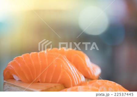 Salmon sushi, bokeh background with copy space Salmon sushi, bokeh background with copy space 22537445