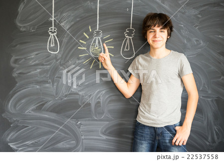 Teenager boy getting an idea 22537558