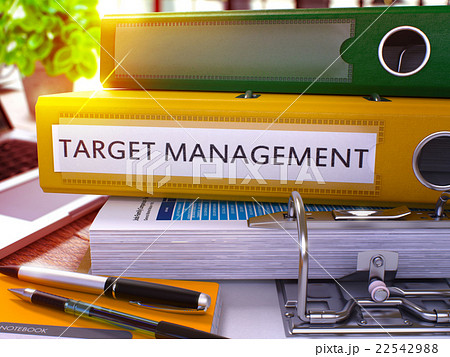 Target Management on Yellow Ring Binder. Blurred 22542988
