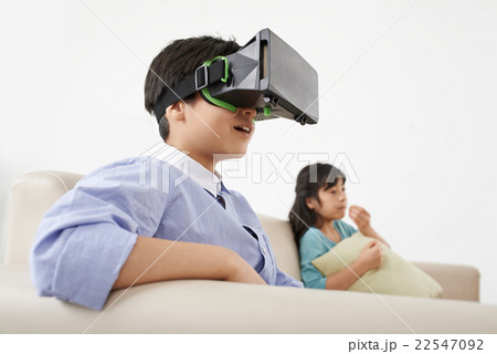 Boy in virtual goggles Boy in virtual goggles 22547092