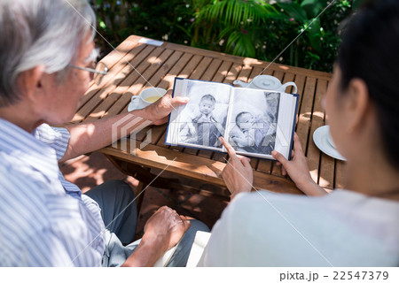 Watching photos of baby boy 22547379