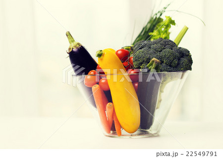 close up of ripe vegetables in glass bowl on table close up of ripe vegetables in glass bowl on table 22549791