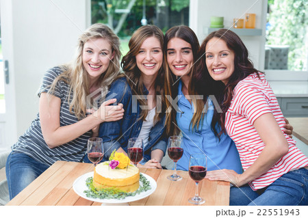 Portrait of beautiful women with birthday cake and glass of red Portrait of beautiful women with birthday cake and glass of red 22551943