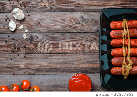 Sausage roasted on the grill. Sausage roasted on the grill. 22557855