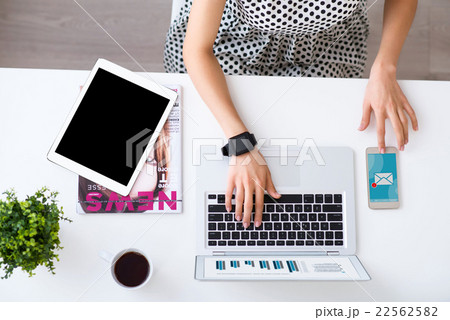 Nice woman working on the laptop Nice woman working on the laptop 22562582