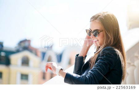 Modern young woman in a big city Modern young woman in a big city 22563169