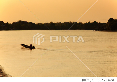 Long tail wood boat engine in the river 22571678