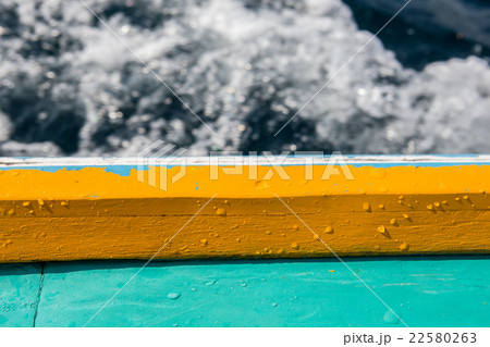 gunnel with wet drop water on blurred waving back gunnel with wet drop water on blurred waving back 22580263