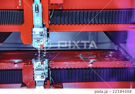 CNC Laser cutting of metal, modern industrial  22584308