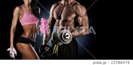 Man and woman isolated on a dark background Man and woman isolated on a dark background 22588479