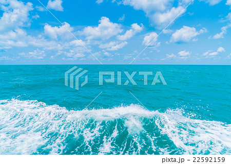 Trail on sea water surface behind boat Trail on sea water surface behind boat 22592159