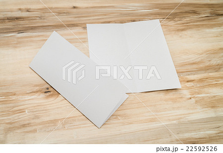 Bifold white template paper on wood texture Bifold white template paper on wood texture 22592526