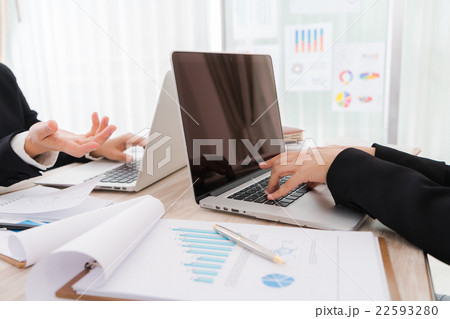 Business people using laptop and Financial charts at meeting office 22593280